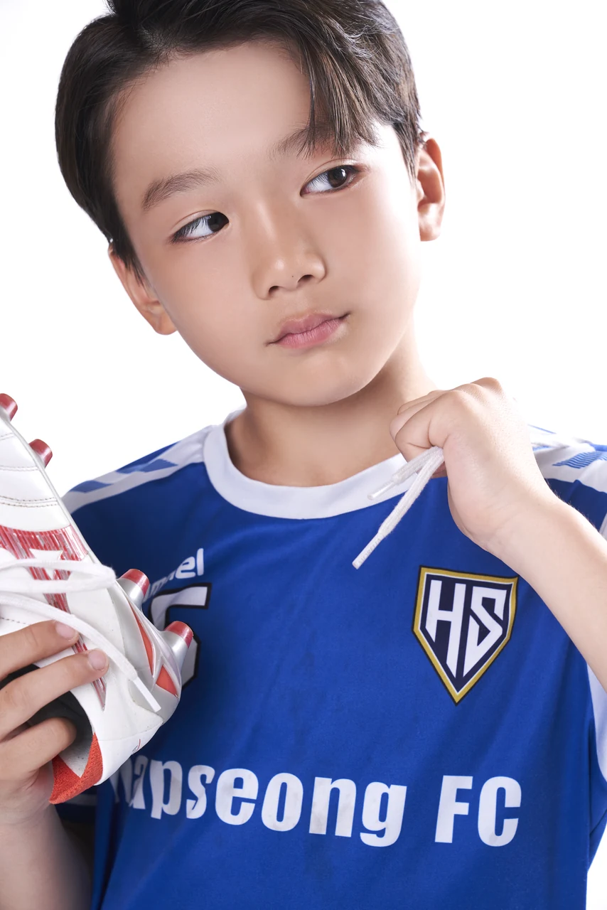 축구 유니폼을 입은 어린이의 스포츠 프로필 사진